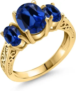 Gem Stone King 18K Yellow Gold Plated Silver Blue Created Sapphire 3-Stone Ring For Women (3.51 Cttw, Oval 9X7MM and 6X4MM, Available 5,6,7,8,9)